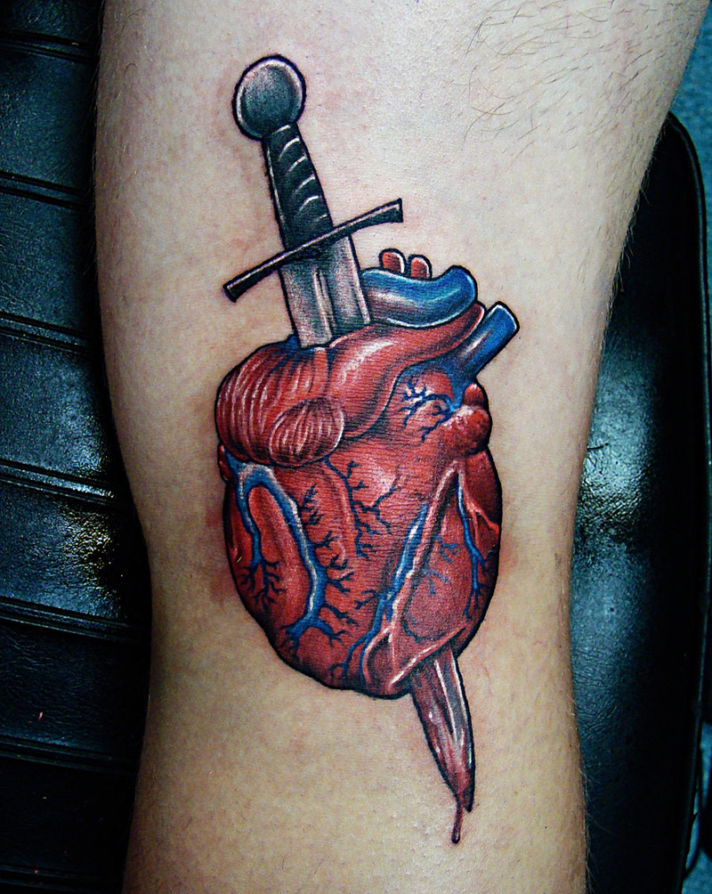 Tattoo coração com fogo ❤️‍🔥 - Tatuaria Tradicional 92